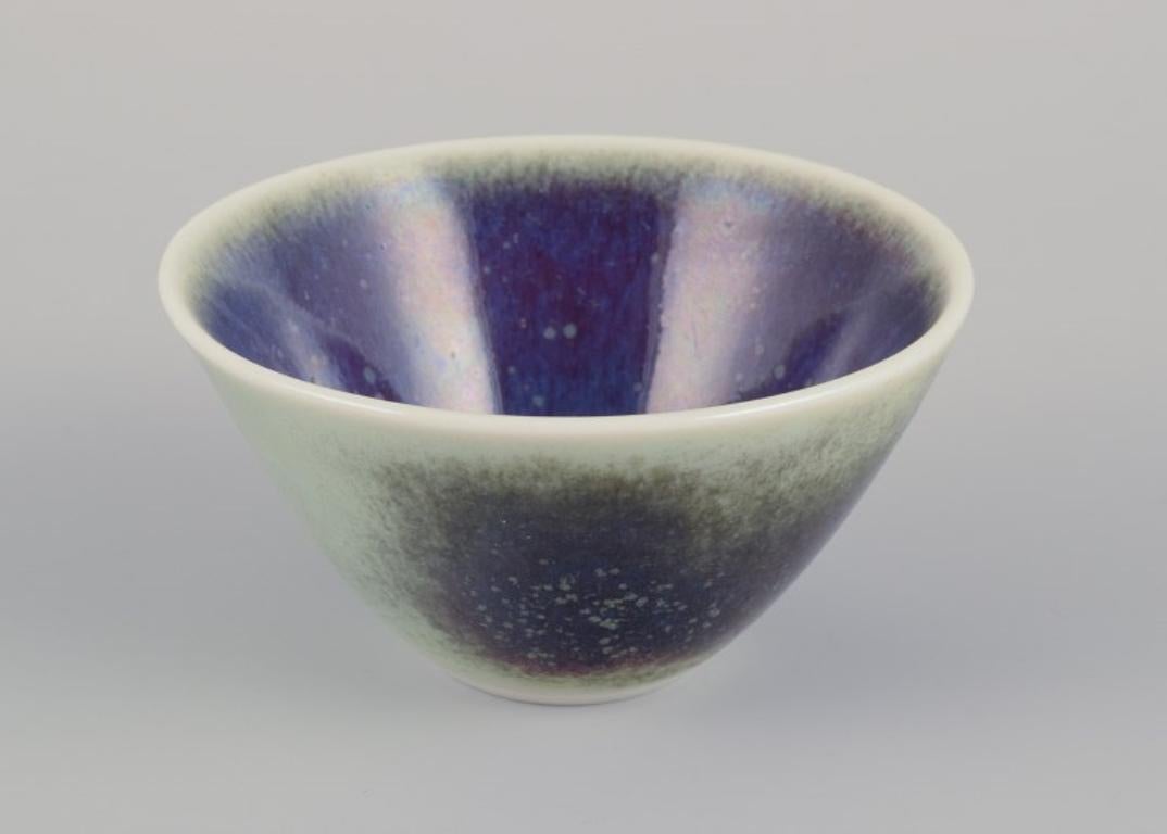 Glazed Three Rörstrand ceramic bowls with glaze in violet and green shades. For Sale