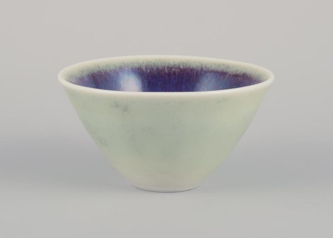 Ceramic Three Rörstrand ceramic bowls with glaze in violet and green shades. For Sale