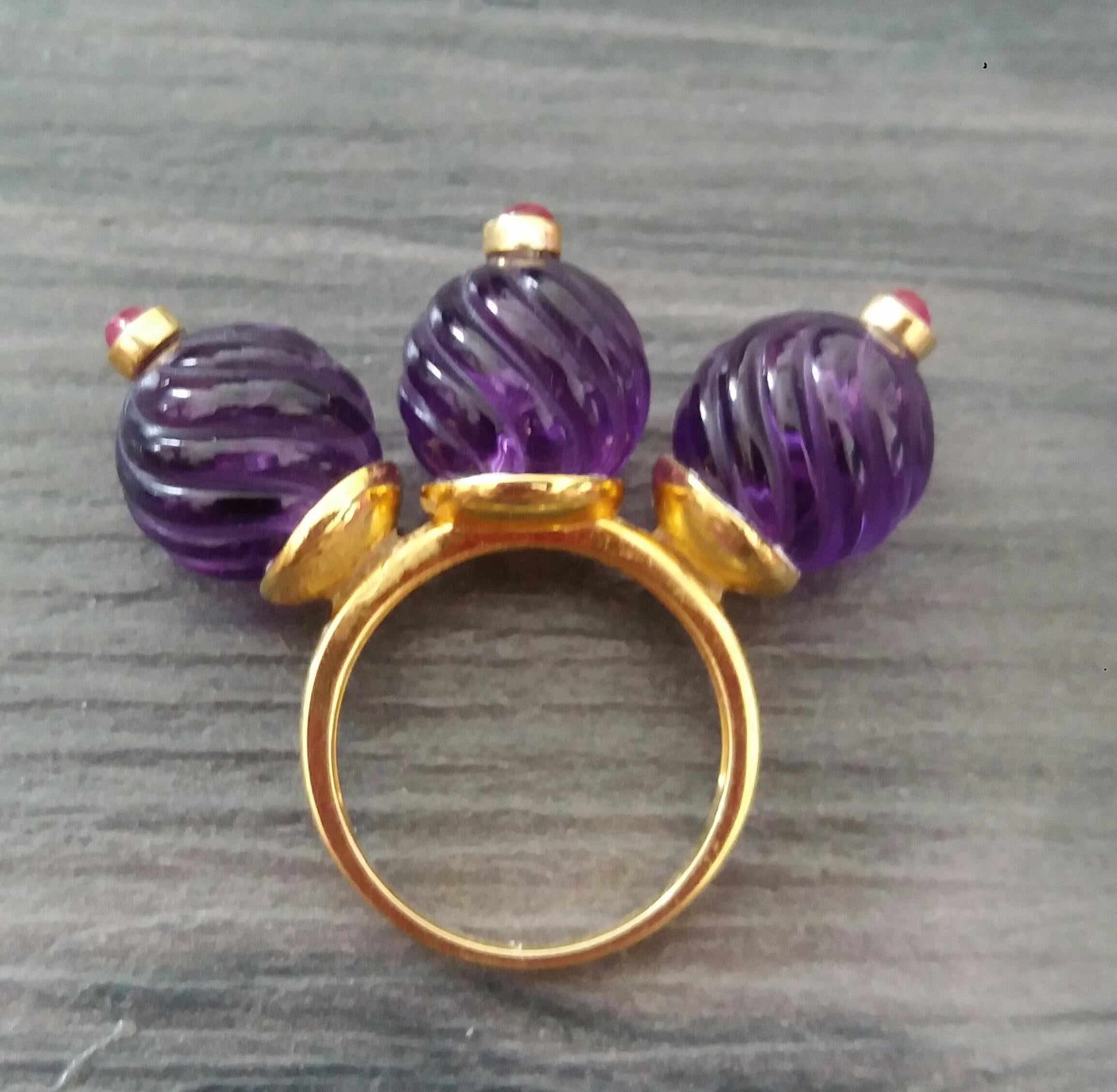 Contemporary Three Round Carved Amethyst Beads Ruby Round Cabs 14K Yellow Gold Cocktail Ring For Sale