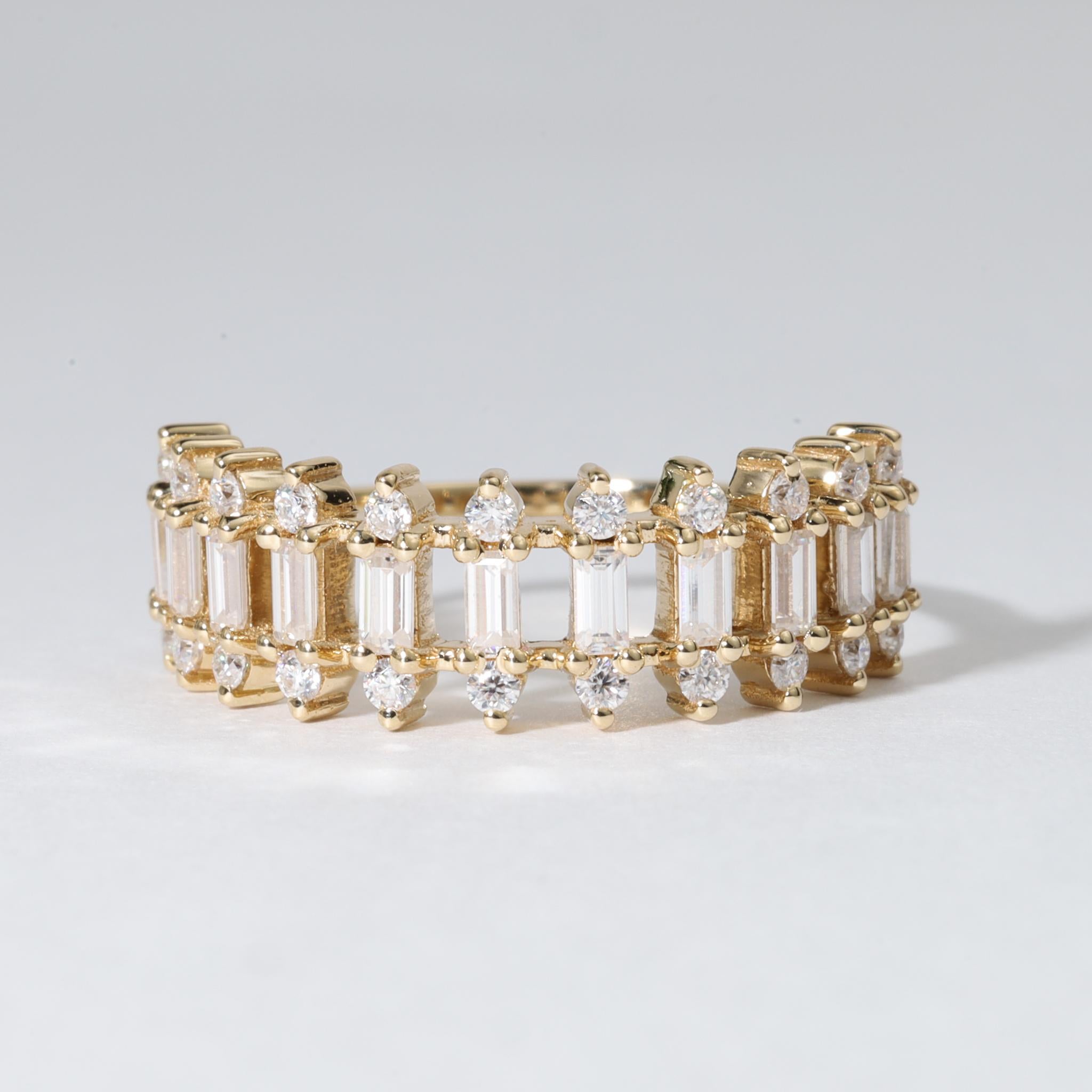 An Icon of Timeless Brilliance and Modern Elegance

Refined and radiant, this exquisite three-row diamond wedding ring is a celebration of craftsmanship, light, and lasting love. Meticulously handcrafted in 18K yellow gold, the band is set with