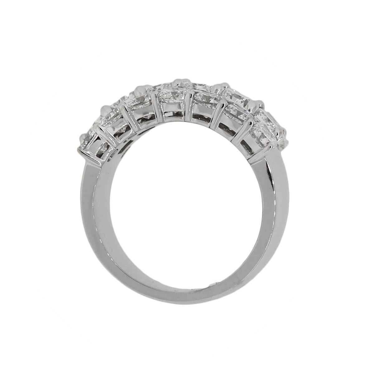 Material: 18k white gold
Diamond Details: Approximately 3.26ctw of cushion cut diamonds and approximately 2.60ctw of round brilliant diamonds. Diamonds are G/H in color and VS in clarity
Ring Size: 6.50
Ring Measurements: 0.90″ x 0.44″ x 0.83″
Total