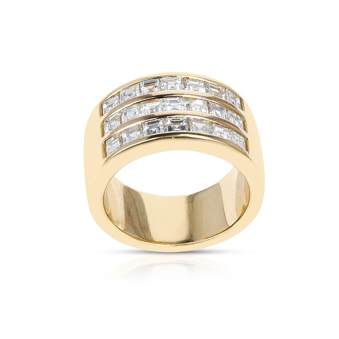 A Three Row Diamond Band made in 18 Karat Yellow Gold. The total weight of the diamonds is 2.14 carats. The total weight of the ring is 13.18 grams. The ring size is US 5 ¾. 