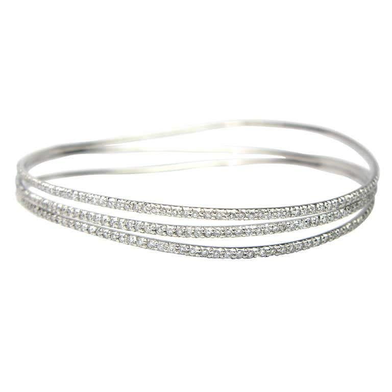 Round Cut Elegant Three Row 2.38 Carat Diamond Bangle For Sale