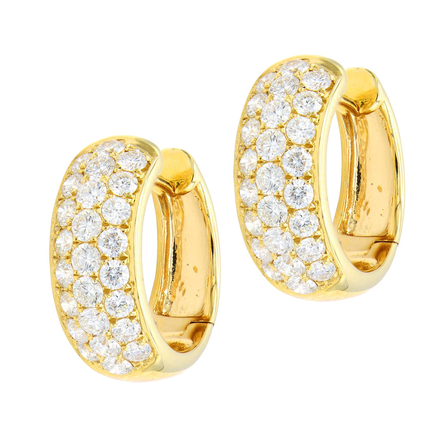 14 Karat Yellow gold hoop earrings featuring three rows of round brilliants weighing 1.50 carats.
50 Diamonds
Color G-H
Clarity SI
