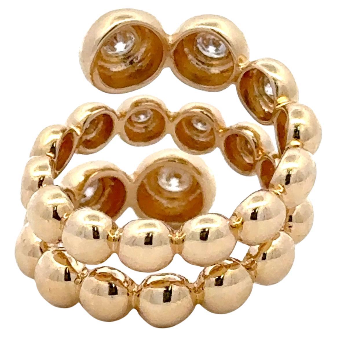 14 Karat yellow gold ring featuring three rows of 13 round brilliants weighing 0.93 carats in a swirl design. Color G Clarity VS2
19.8 MM High

Available in White & Rose Gold.

More fashion rings in stock.
Message for pictures and details. 


