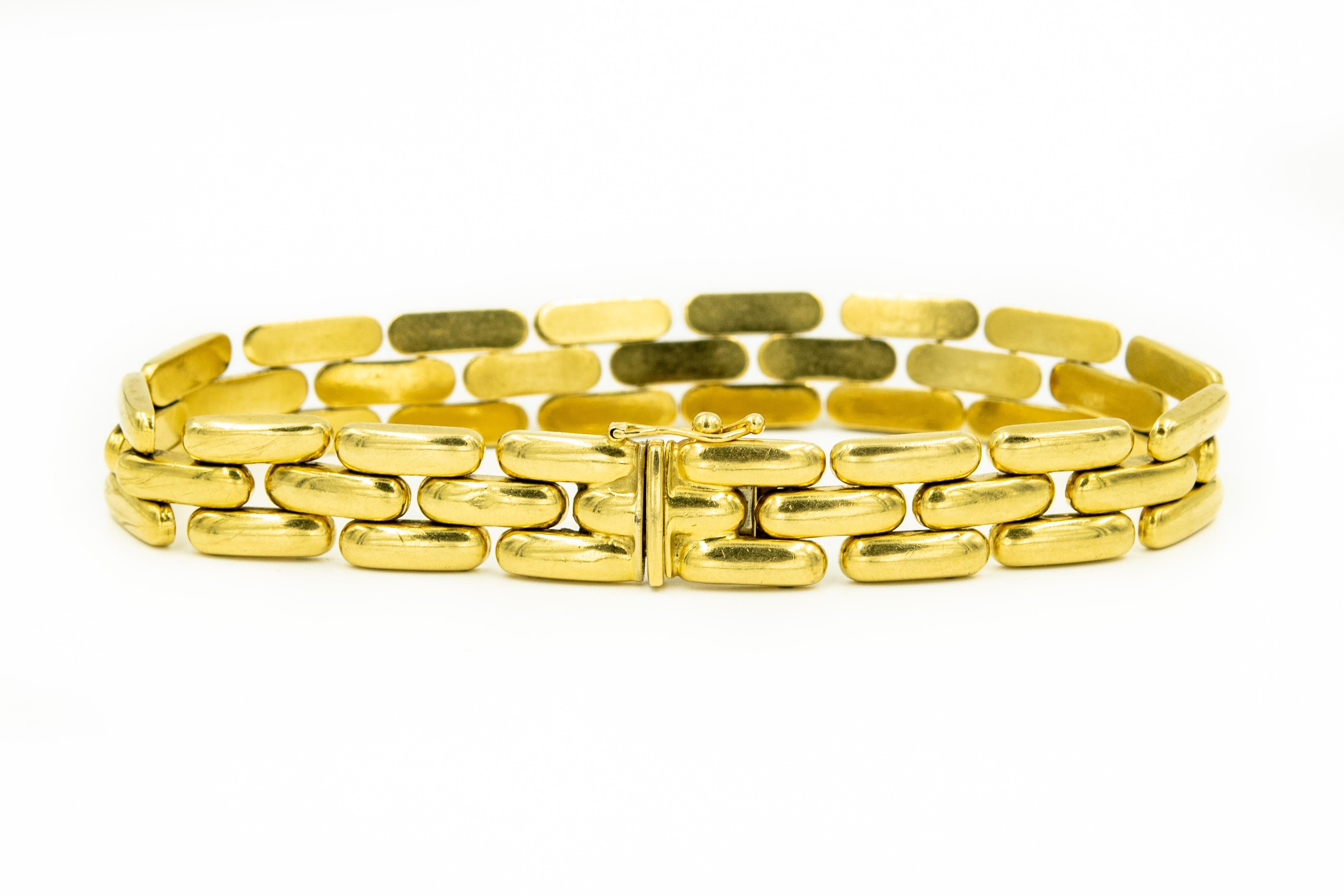 Late 20th Century Italian Panthere gold bar link 18k bracelet featuring a .42