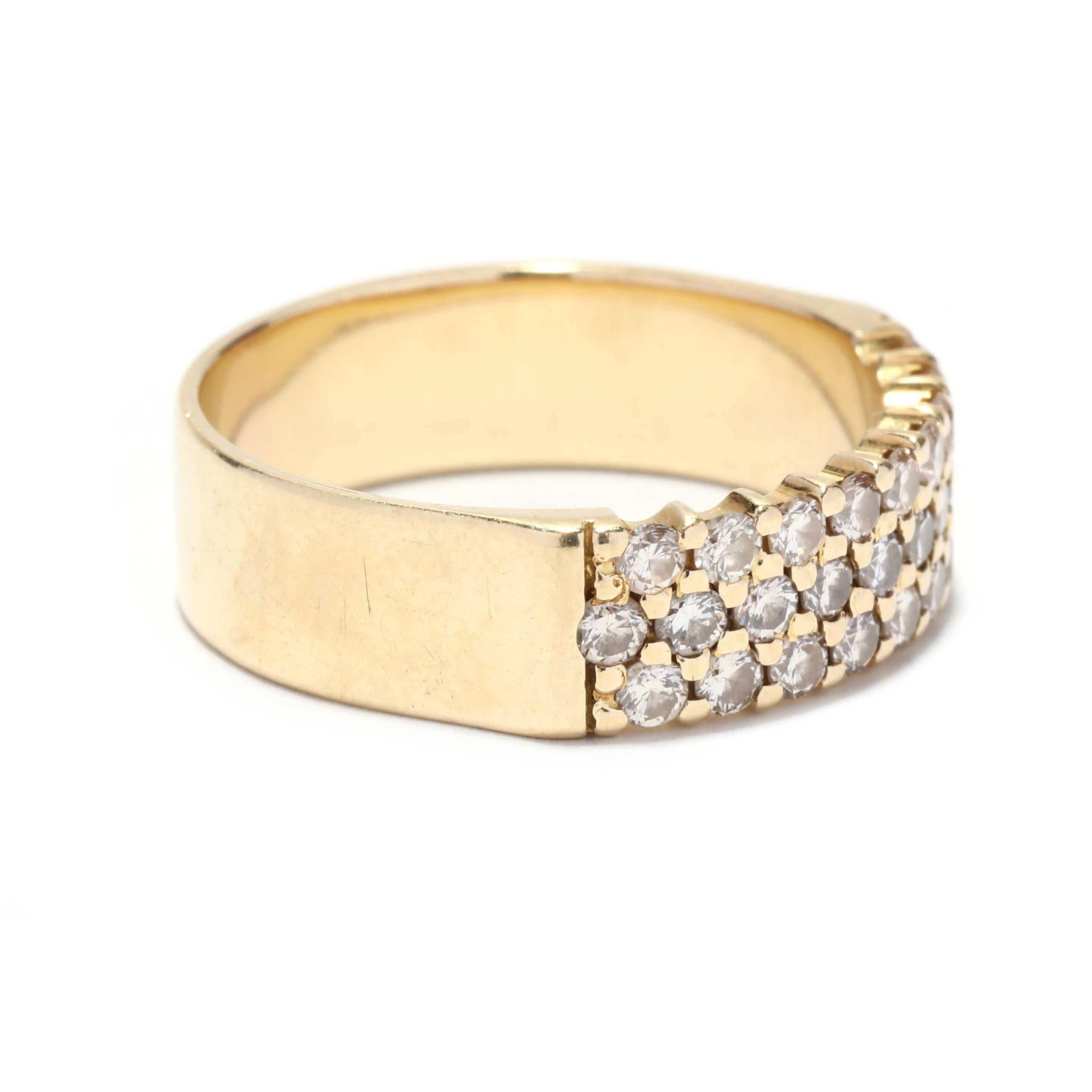 A vintage 14 karat yellow gold three row pavé diamond band ring. This wide band ring features three rows of pavé set round brilliant cut diamonds weighing approximately .75 total carats and with a wide, straight polished band.

Stones:
- diamonds,