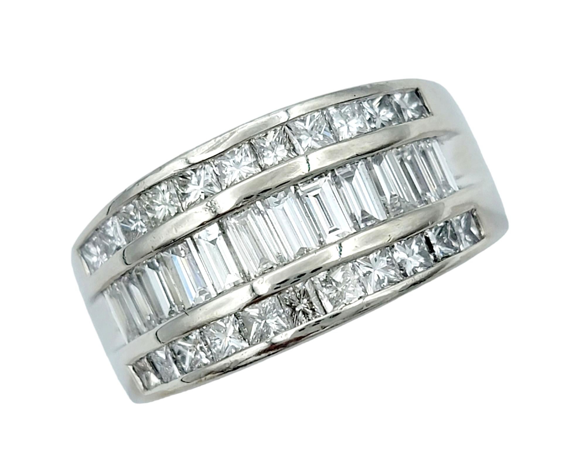 Ring size: 7.25

Absolutely gorgeous multi row diamond semi-eternity band ring. This remarkable ring features glittering rows of icy white diamonds that shimmer and shine from every angle, beautifully enhancing the polished platinum setting. 

The