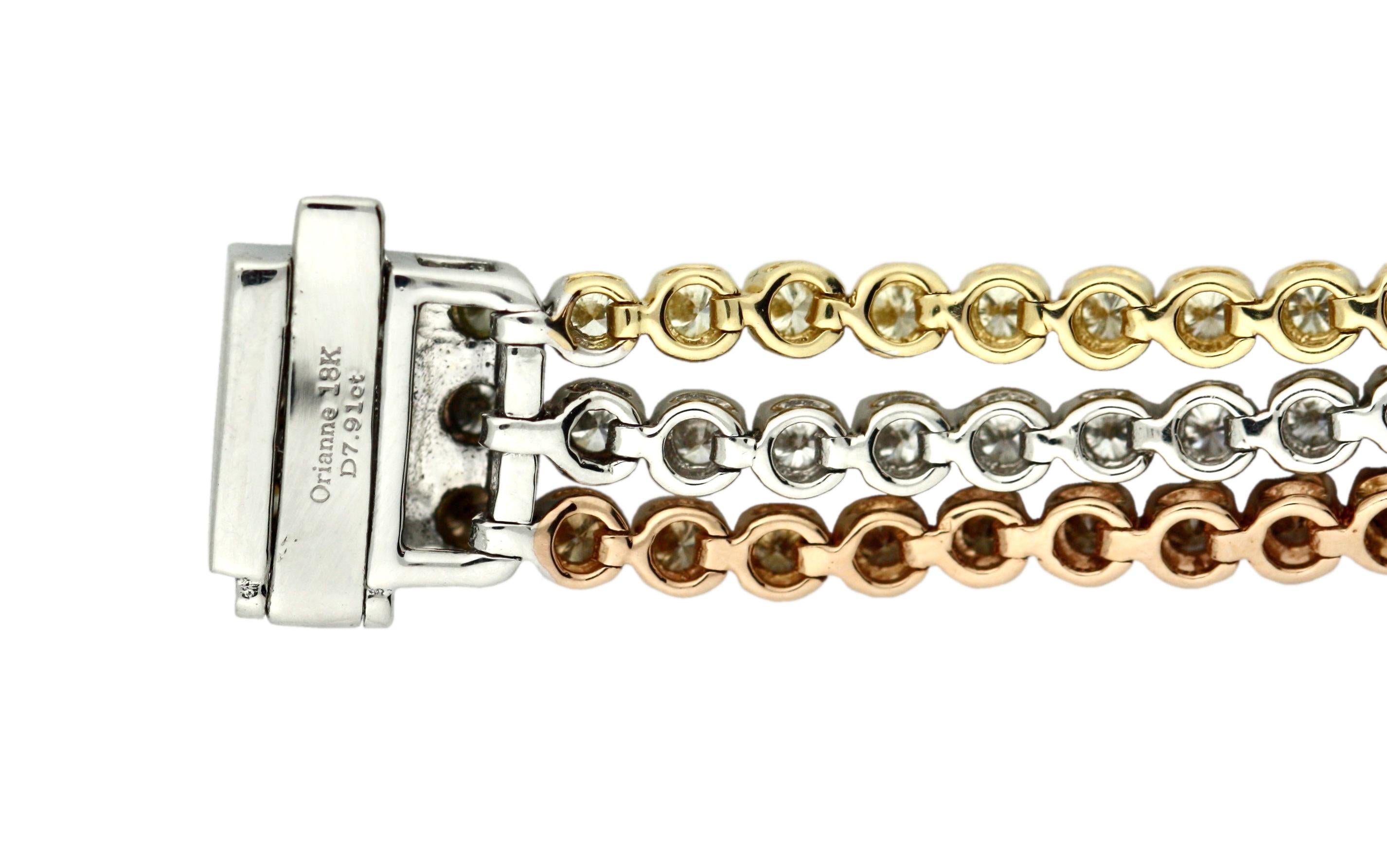 
Three Row Tennis Bracelet
Diamonds weighing a total of 7.91 carats
mounted in eighteen yellow, rose and white gold
7 1/2 inches