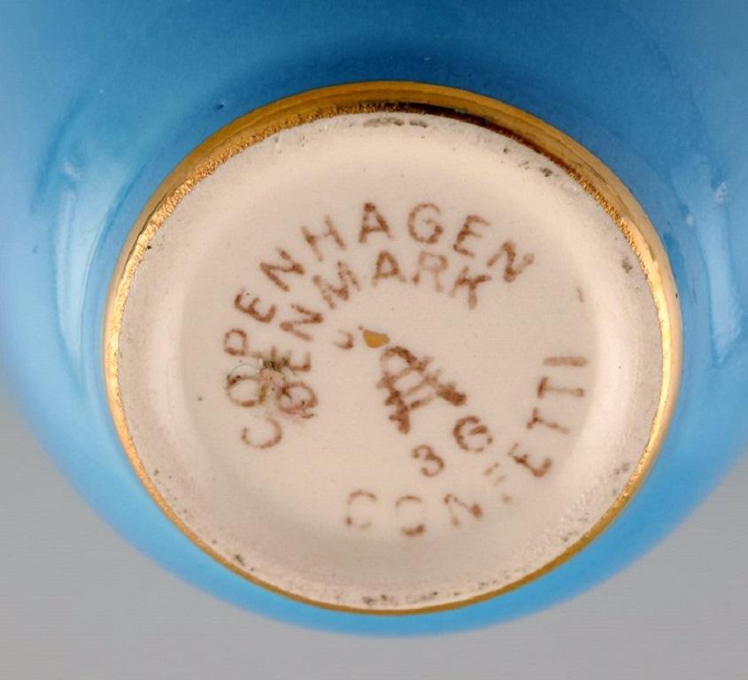 20th Century Three Royal Copenhagen / Aluminia Confetti mocha cups with saucers.