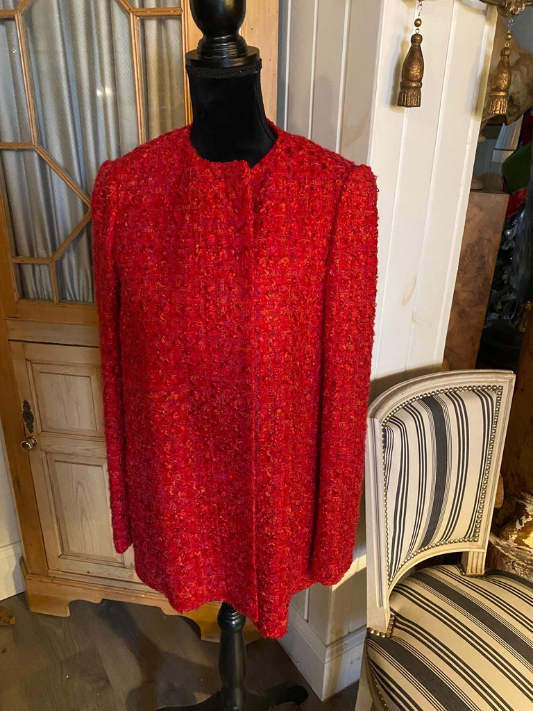 Three Sam Kori Greorge Courture Atelier Boucle Jackets In The Style Of Chanel. 
Each is a wool boucle collarless jacket in blue, brown, and red.  
Priced per jacket.

Approximately size 12-14