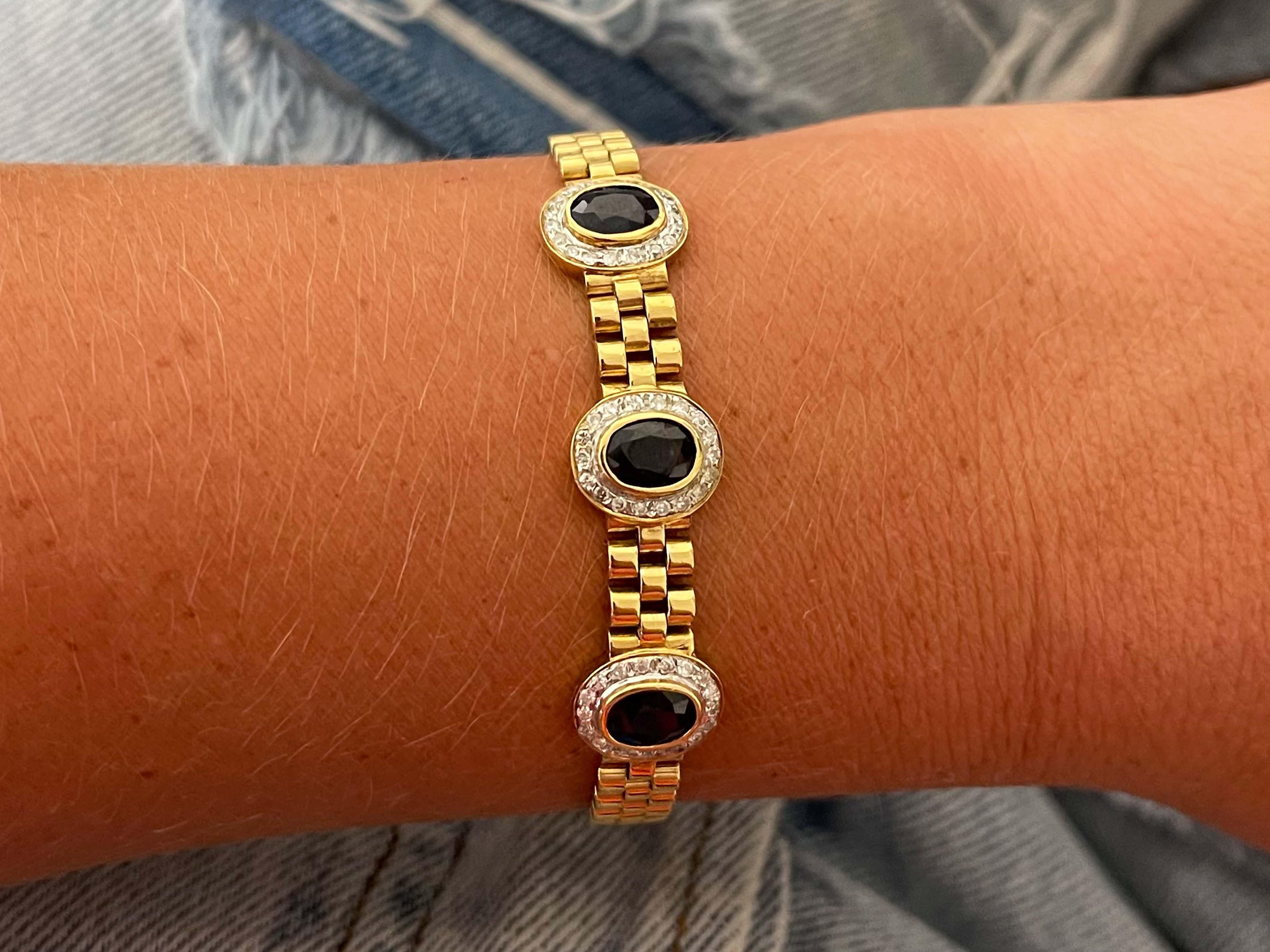 Bracelet Specifications:

Metal: 18k Yellow Gold

Sapphire Count: 3 Oval Sapphires

Sapphire Carat Weight: ~ 2.0 carats

Diamond Count: 54

Diamond Color: G

Diamond Clarity: VS-SI1

Diamond Carat Weight: 0.50

Bracelet Length: ~7 inches

Bracelet