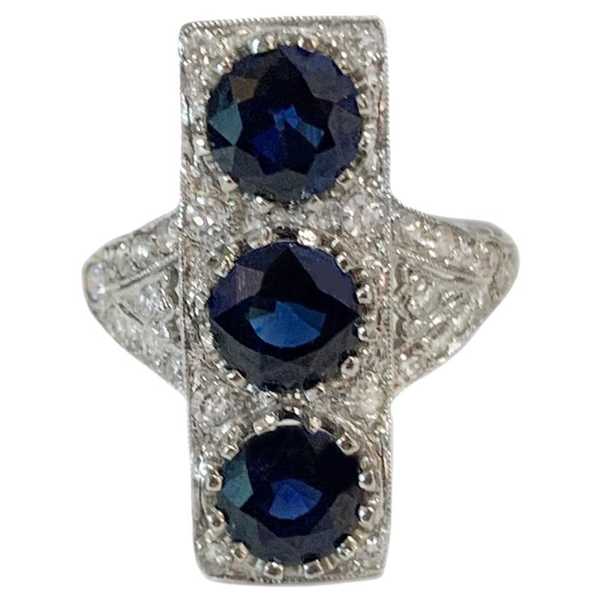 Three Sapphire Ring with Diamonds For Sale