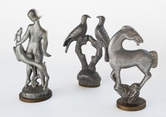 Tres sellos decorativos escandinavos modernos de peltre de los años 30