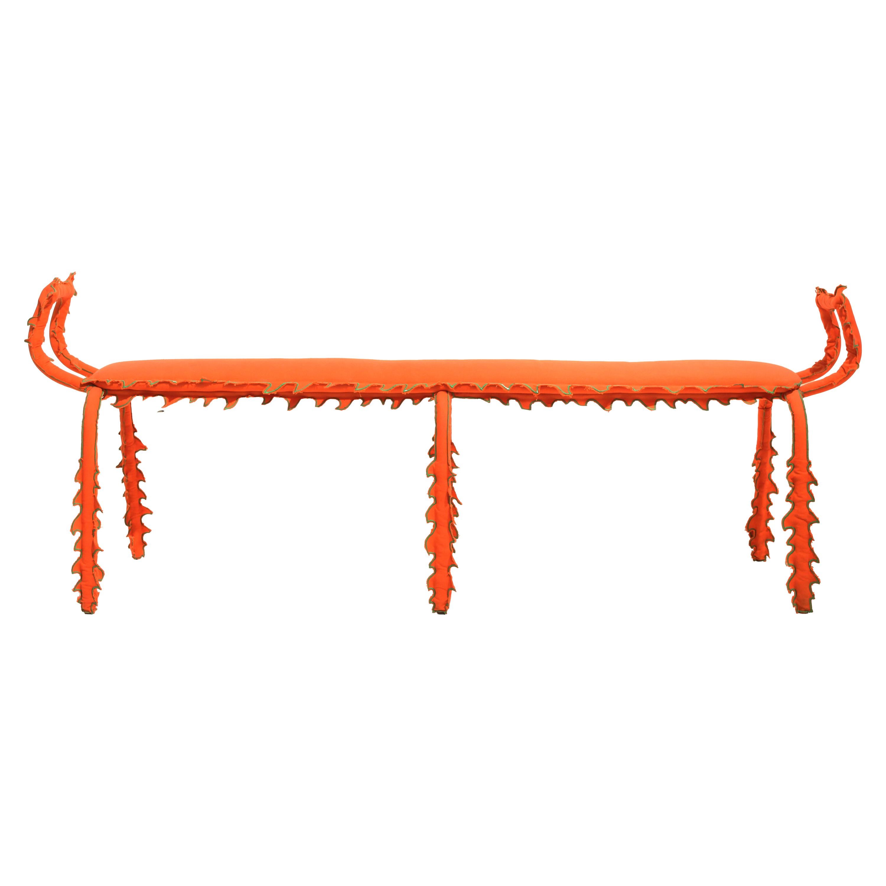 The three-seat bench from the Disguise Series 00 collection, created by Madrid-based ESTO Studio, is conceived as a sculptural piece that blurs the boundaries between furniture and fiction.

Featuring a curved tubular steel structure and a hand-sewn