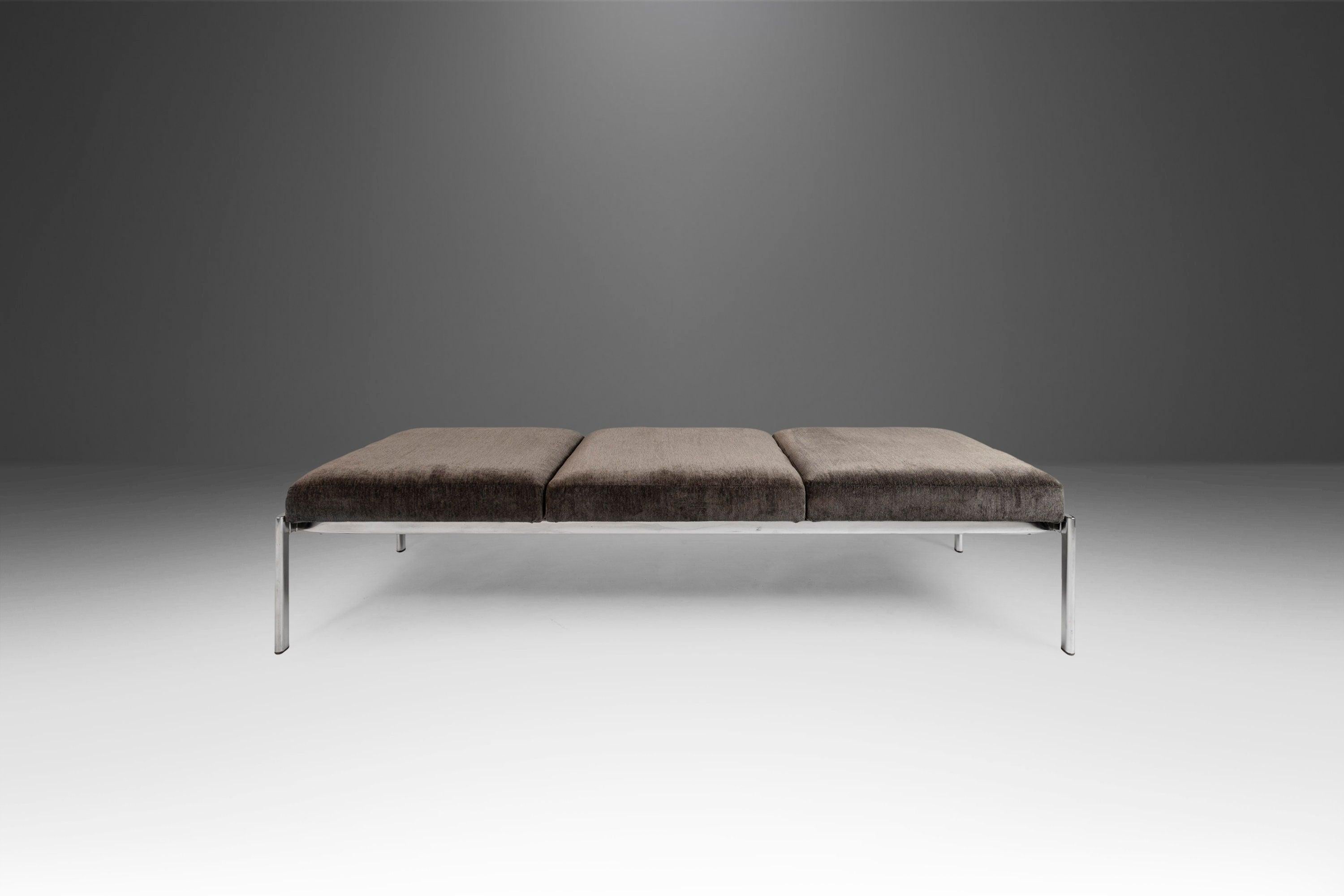 Equal parts style and comfort this luxurious three-seater bench designed by Ilmari Tapiovaara for Stendig is the epitome of Contemporary design. The solid chrome frame, in wonderful vintage condition, is eye-catching from all angles. The original