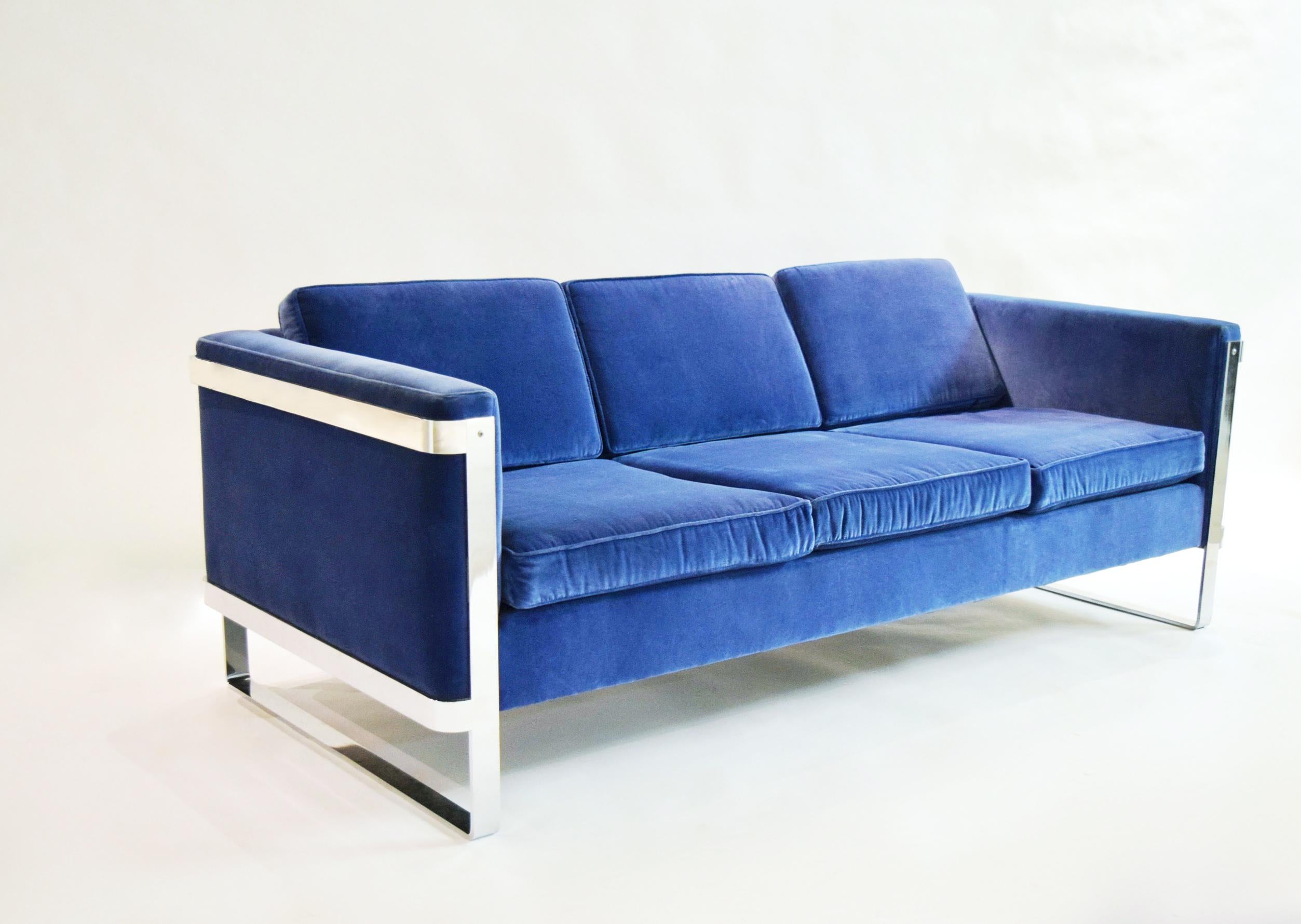 Pace Collection three-seat sofa with a solid, polished steel frame and six re-upholstered cushions in blue velvet. Arm height measures 25.5