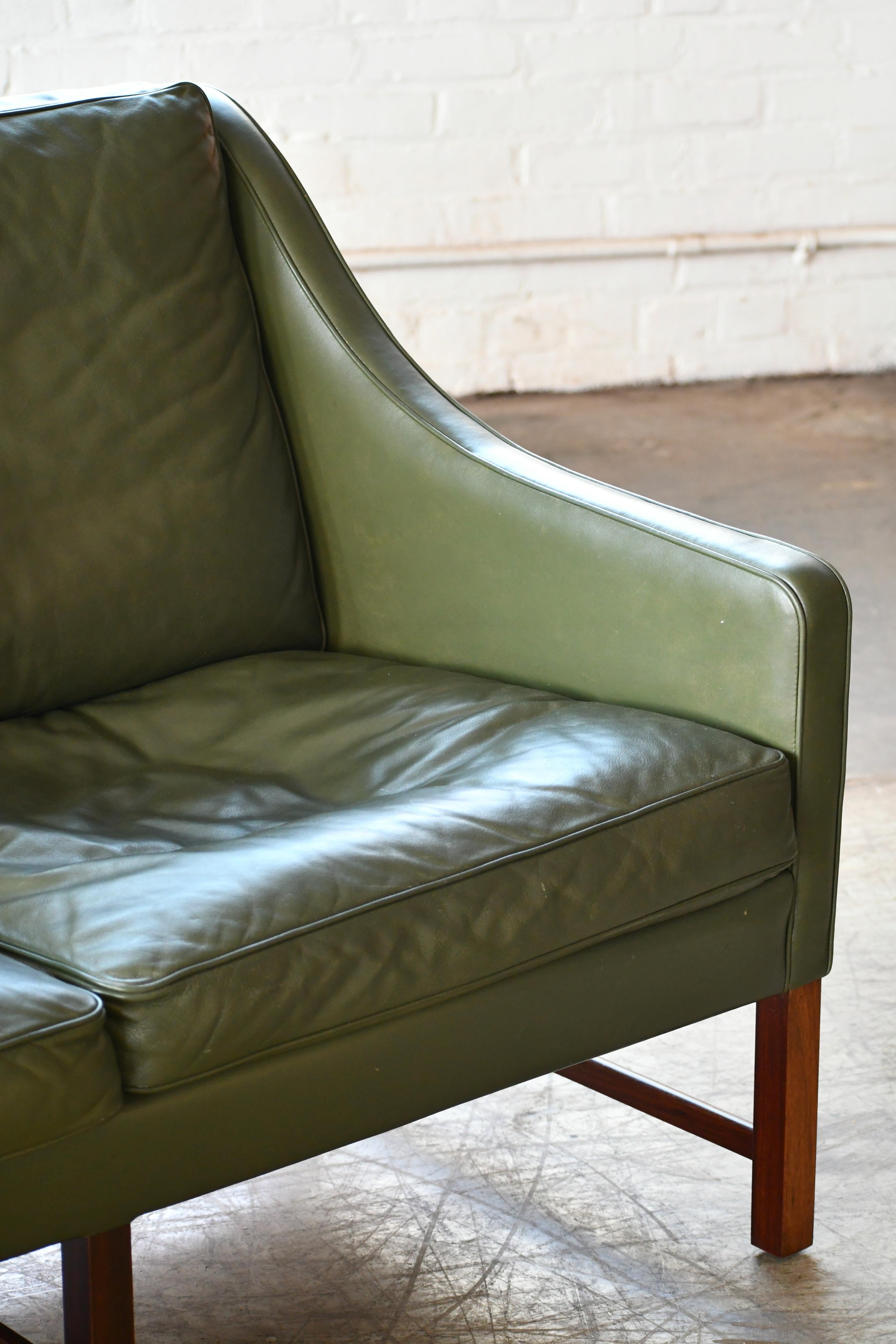 Mid-Century Modern Three-Seat Sofa in Green Leather and Rosewood Attributed to Fredrik Kayser