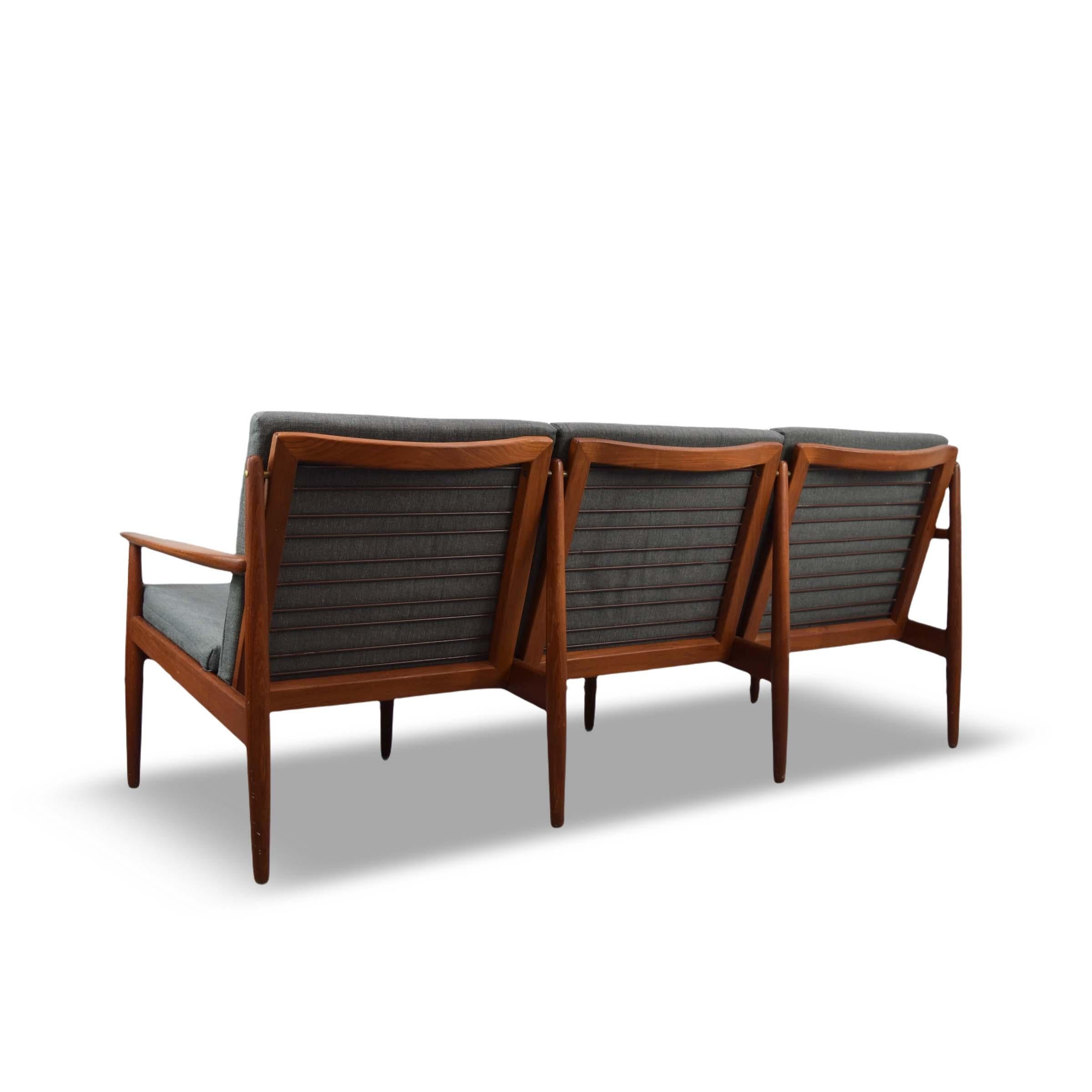Designed by Arne Vodder and manufactured by Glostrup Møbelfabrick, circa 1960s (stamped). All seat cords are present and in good condition. Comfortable and elegant design. 

Recently reupholstered. Reupholstery and refinishing can be arranged to
