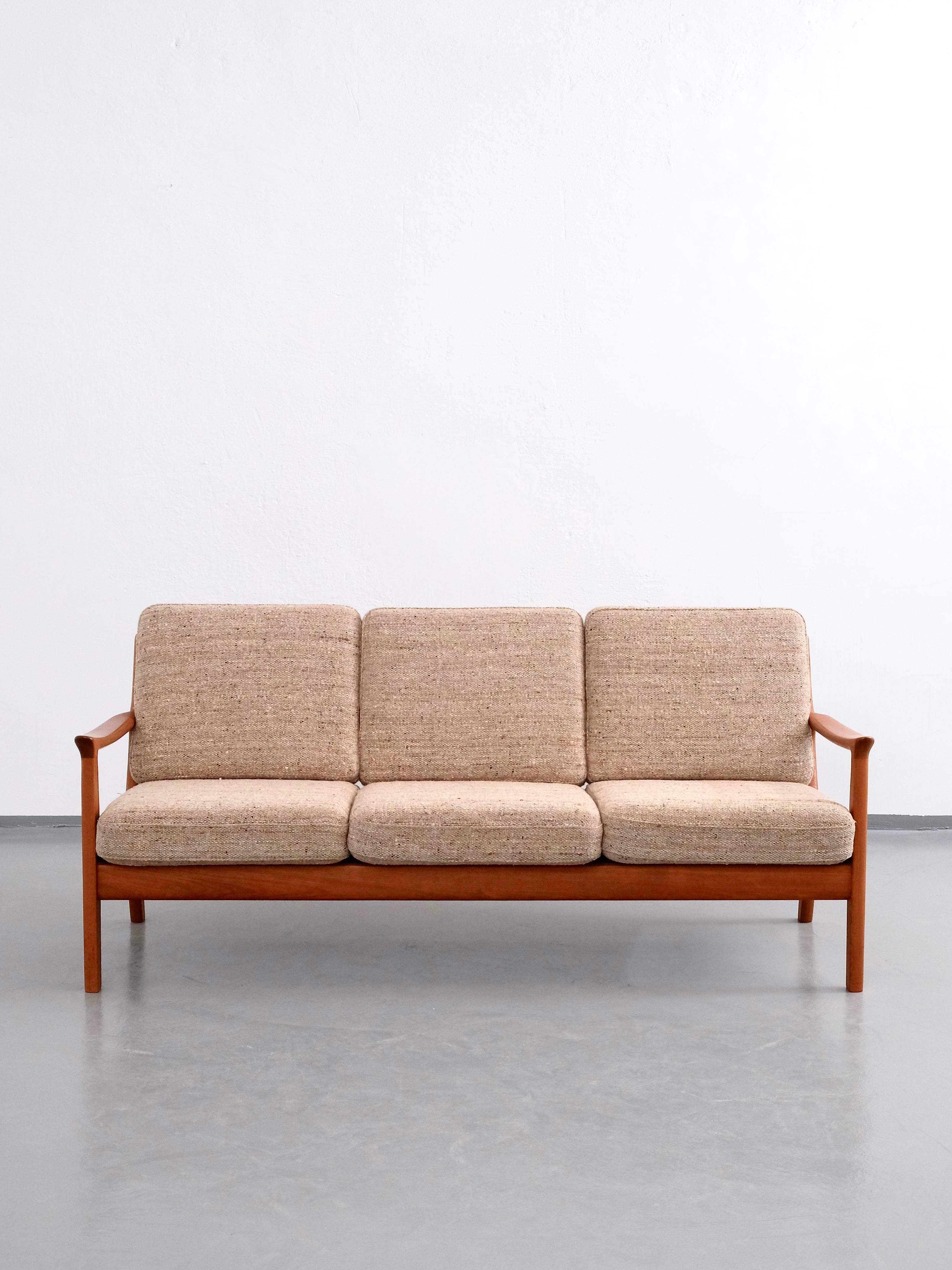 Three-seat sofa by Juul Kristensen from the 1960s. Structure in teak and removable cushions with original wool upholstery. Stamped 