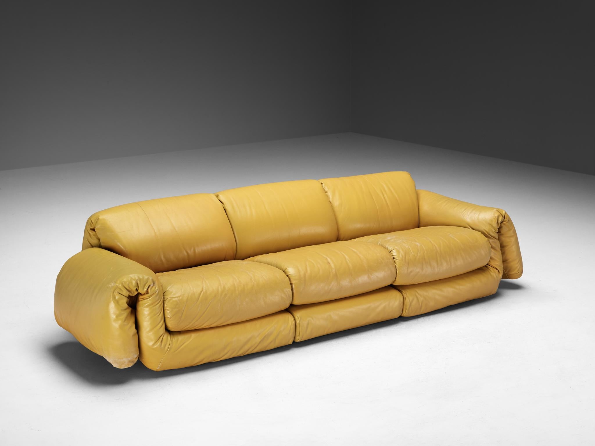 Three seat sofa, leather, Europe, 1970s

Eye catching sofa made in the vibrant 1970s in Europe. This piece serves as a embodiment of both stylish design and comfort, with its plush and very soft leather cushions. This piece boasts a vibrant yellow