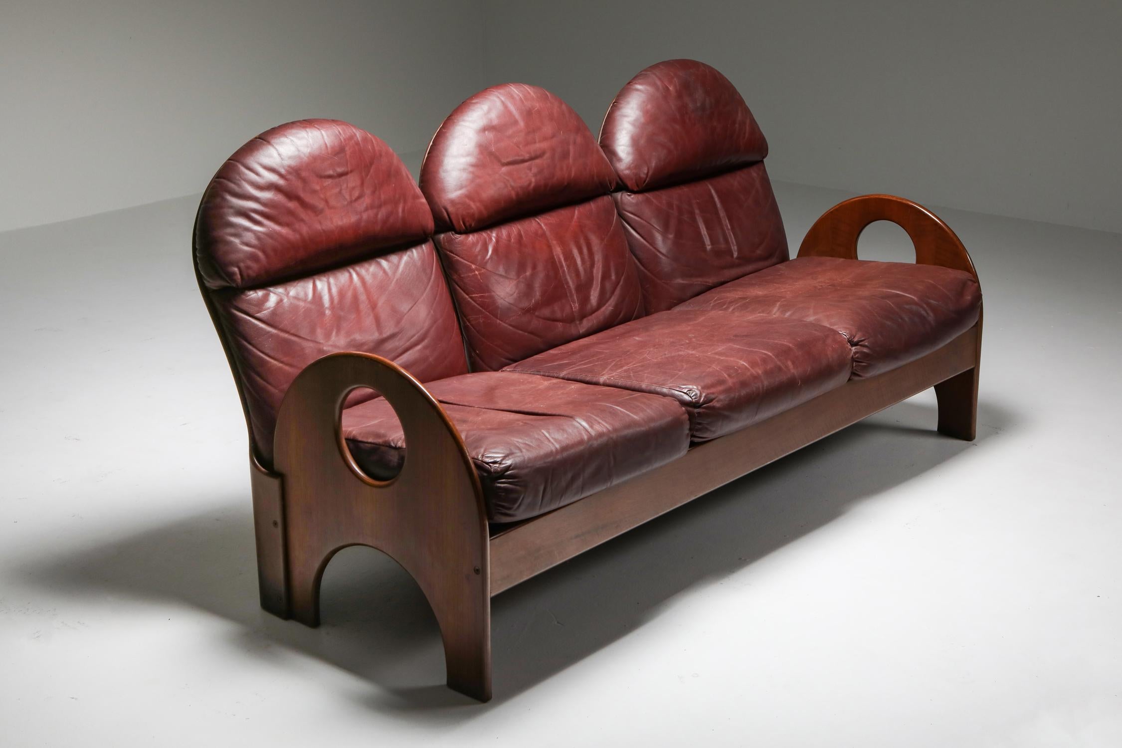 Gae Aulenti; Three-Seater; Arcata; Poltronova; Italian Design; Italy; 1968; Walnut; Burgundy Leather; Mid-Century Modern;

Three-Seater 'Arcata' by Gae Aulenti, Walnut and Burgundy Leather, 1968
 
This three-seater 'Arcata' sofa is designed by