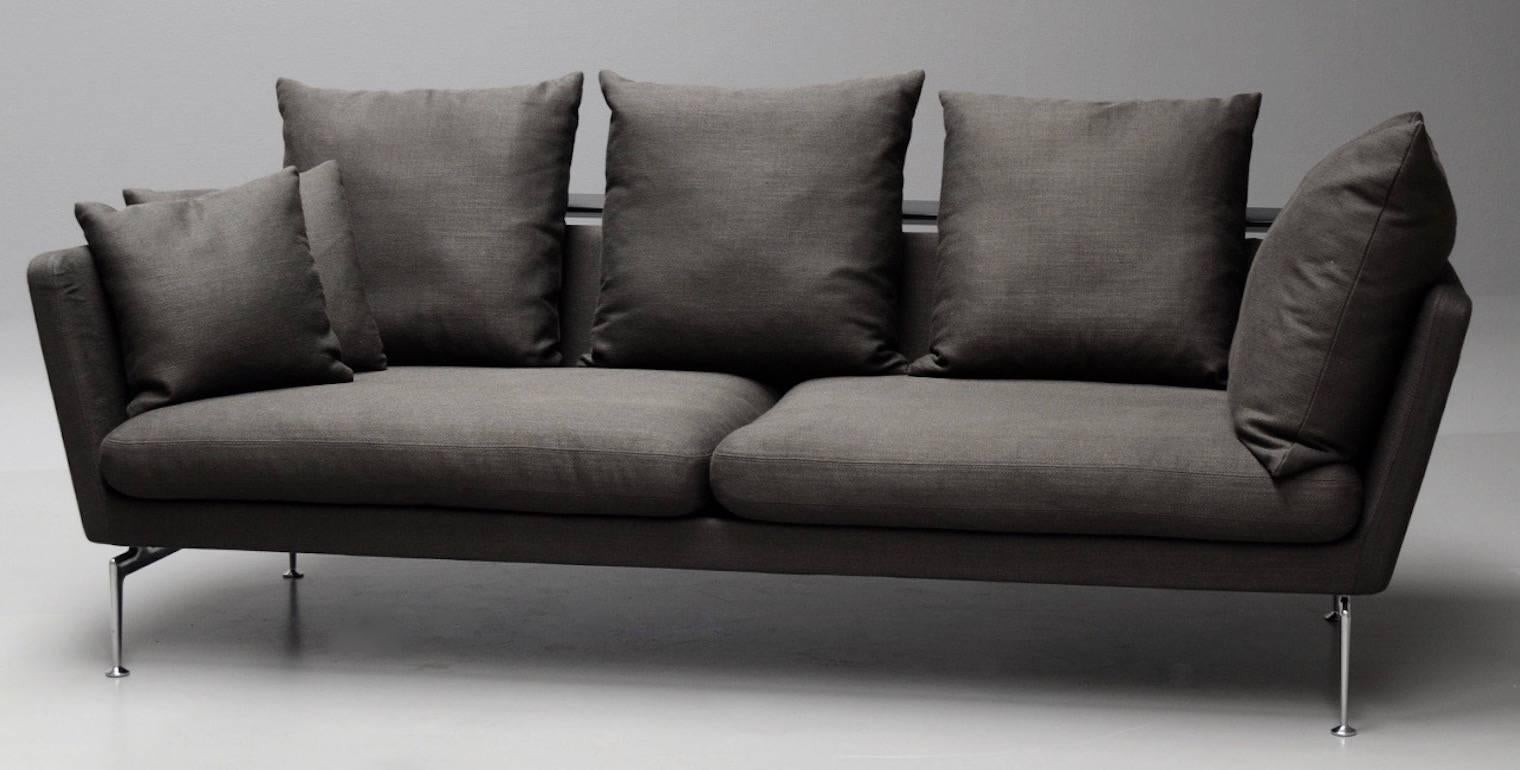 Antonio Citterio three-seat lounge sofa, model Suita, produced by Vitra. Designed in 2010. Shell-shaped construction with polished aluminium base, dark grey 