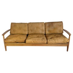 Three seater sofa / bed in leather