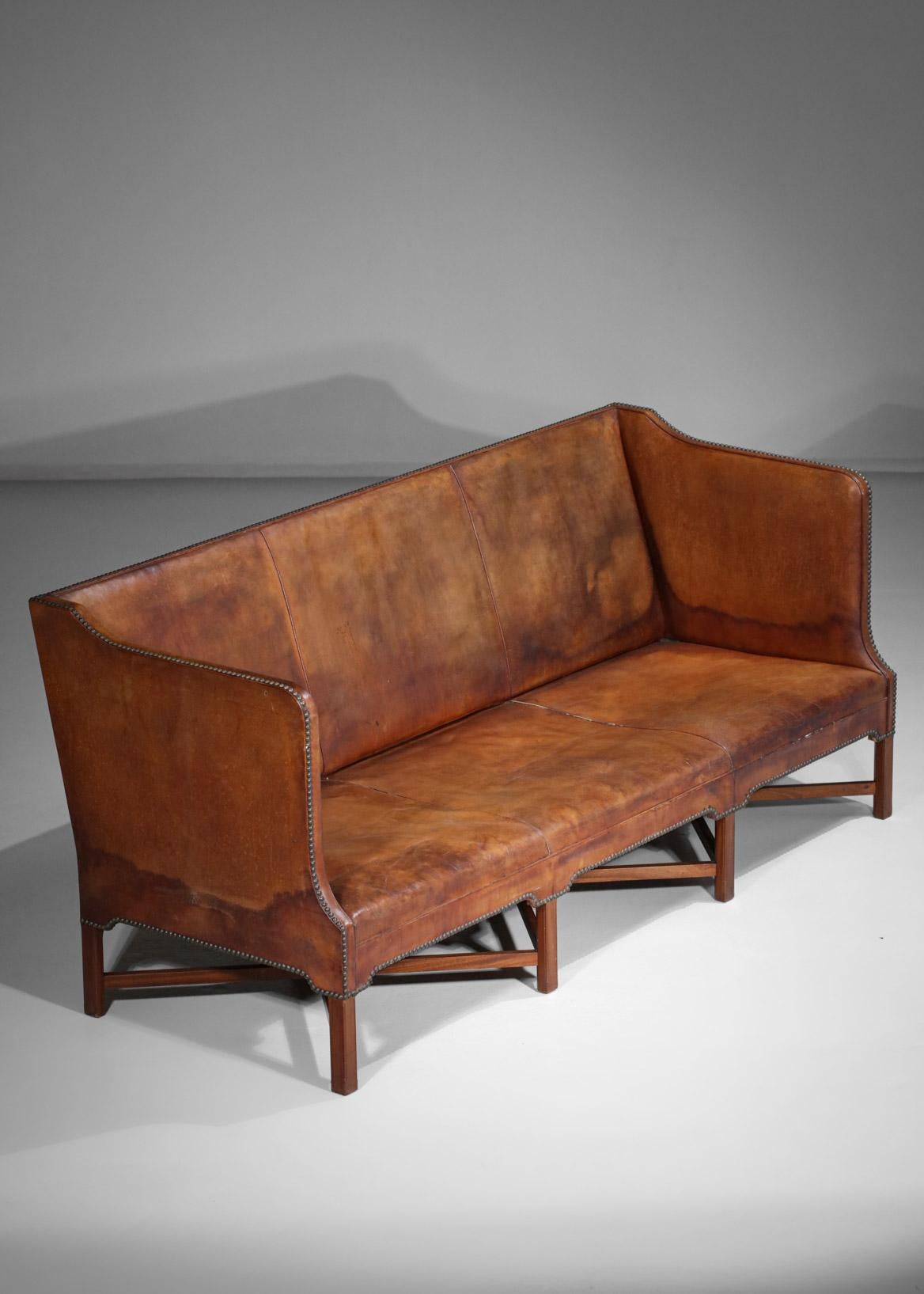 Rare Scandinavian three seat sofa by Danish designer Kaare Klint for Rud Rasmussen. Model 