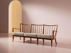 Three-seater sofa in walnut and fabric in the style of Paolo Buffa, Italy, 1940s