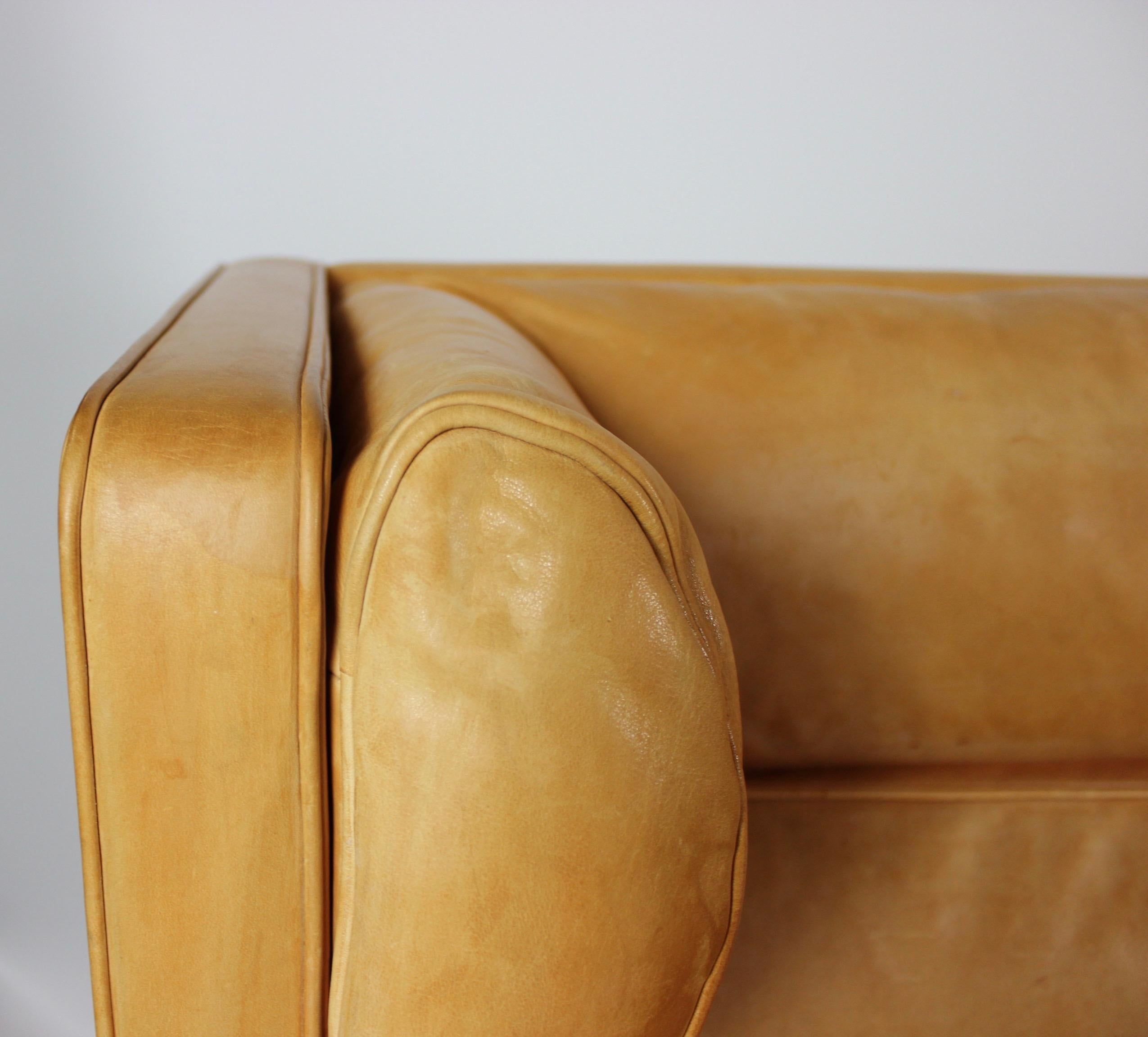 Three-seat sofa, model Kupe, designed by Børge Mogensen and upholstered with light cognac colored leather. The sofa is in great vintage condition.