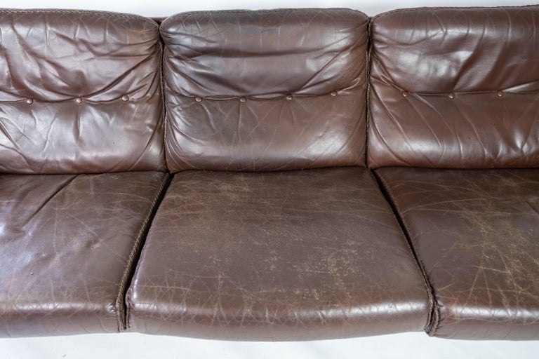 Scandinavian Modern Three Seater Sofa Upholstered with Patinated Brown Leather by Arne Norell, 1970s For Sale