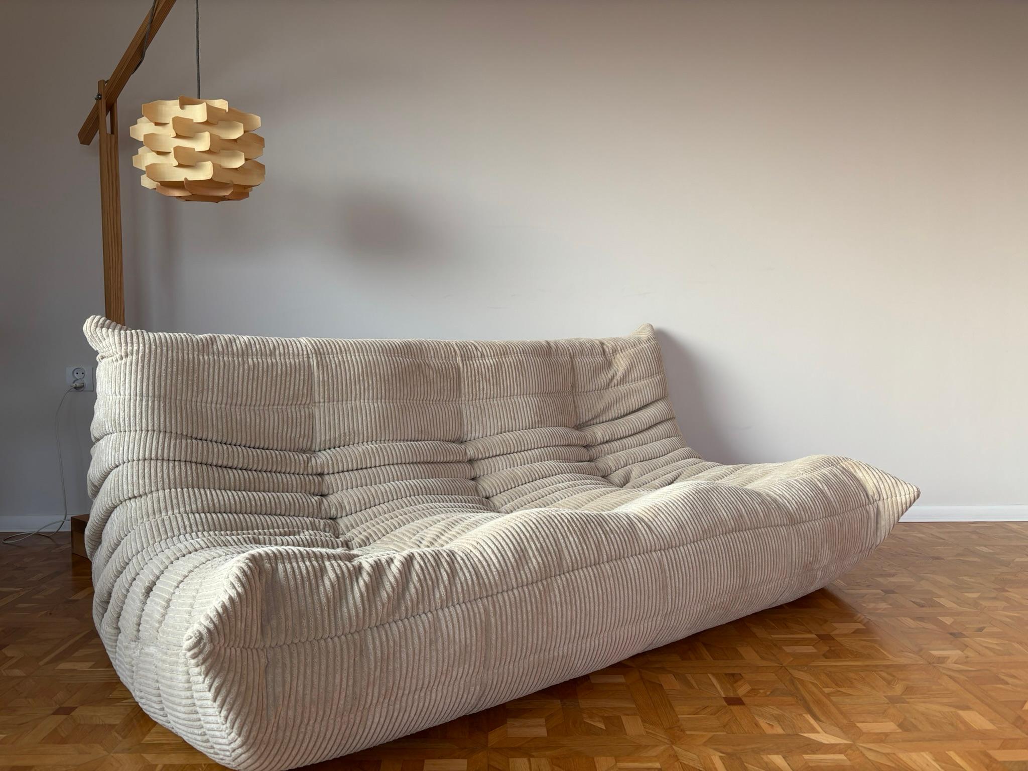 The Togo was designed by Michel Ducaroy in 1973 for Ligne Roset. It is the first sofa/chair ever made only of foam and leather. The collection features an ergonomic design with polyether foam construction and padded covers, making each piece both