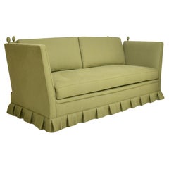 Three seats sofa in the style of Madeleine Castaing, 1970s.