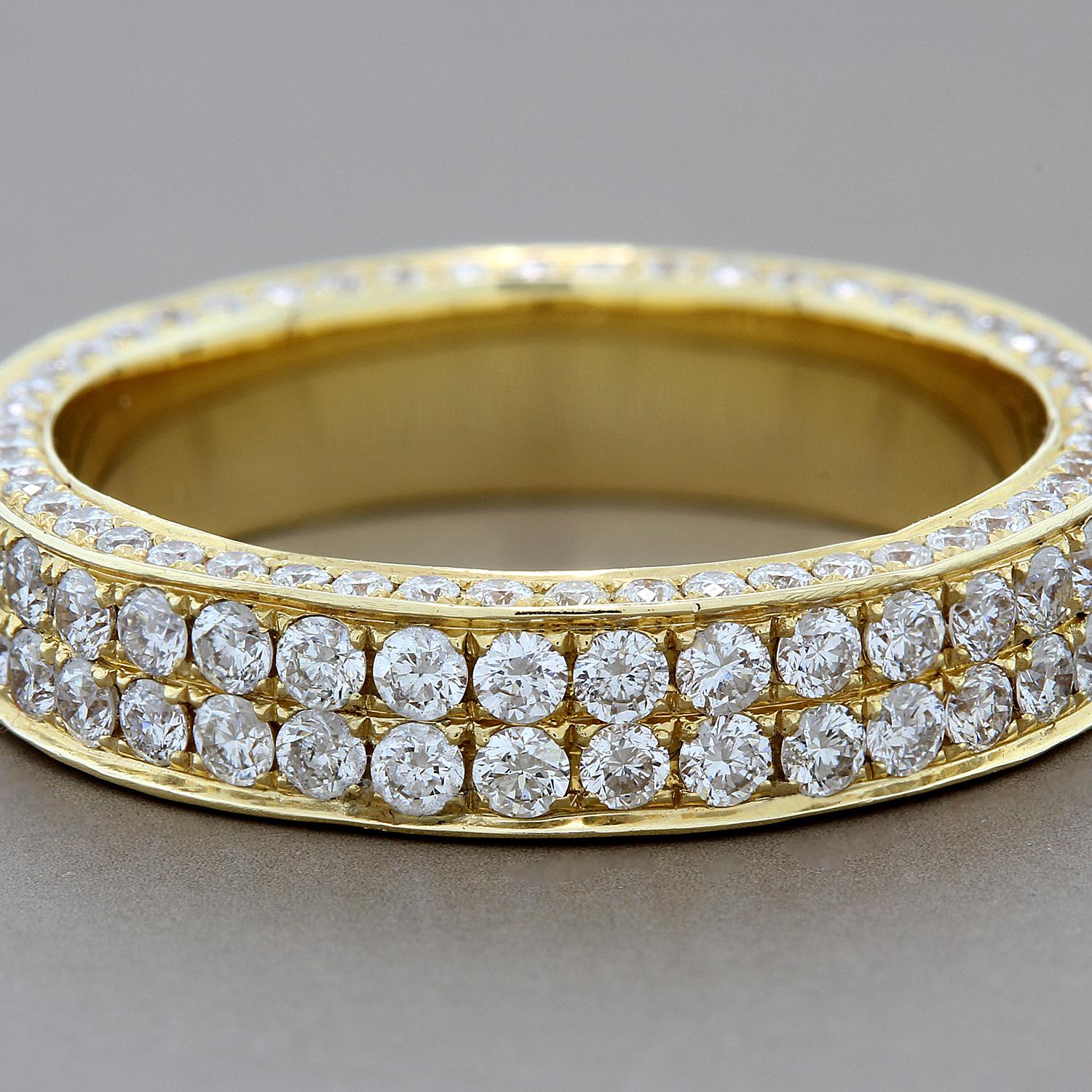 A full circle 1.96 carats of VVS quality round cut diamonds are pave set in this very special eternity band.  Pave diamonds are set on both the top of the band and on the insides.  A custom designed ring set in 14K yellow gold.

Currently ring size