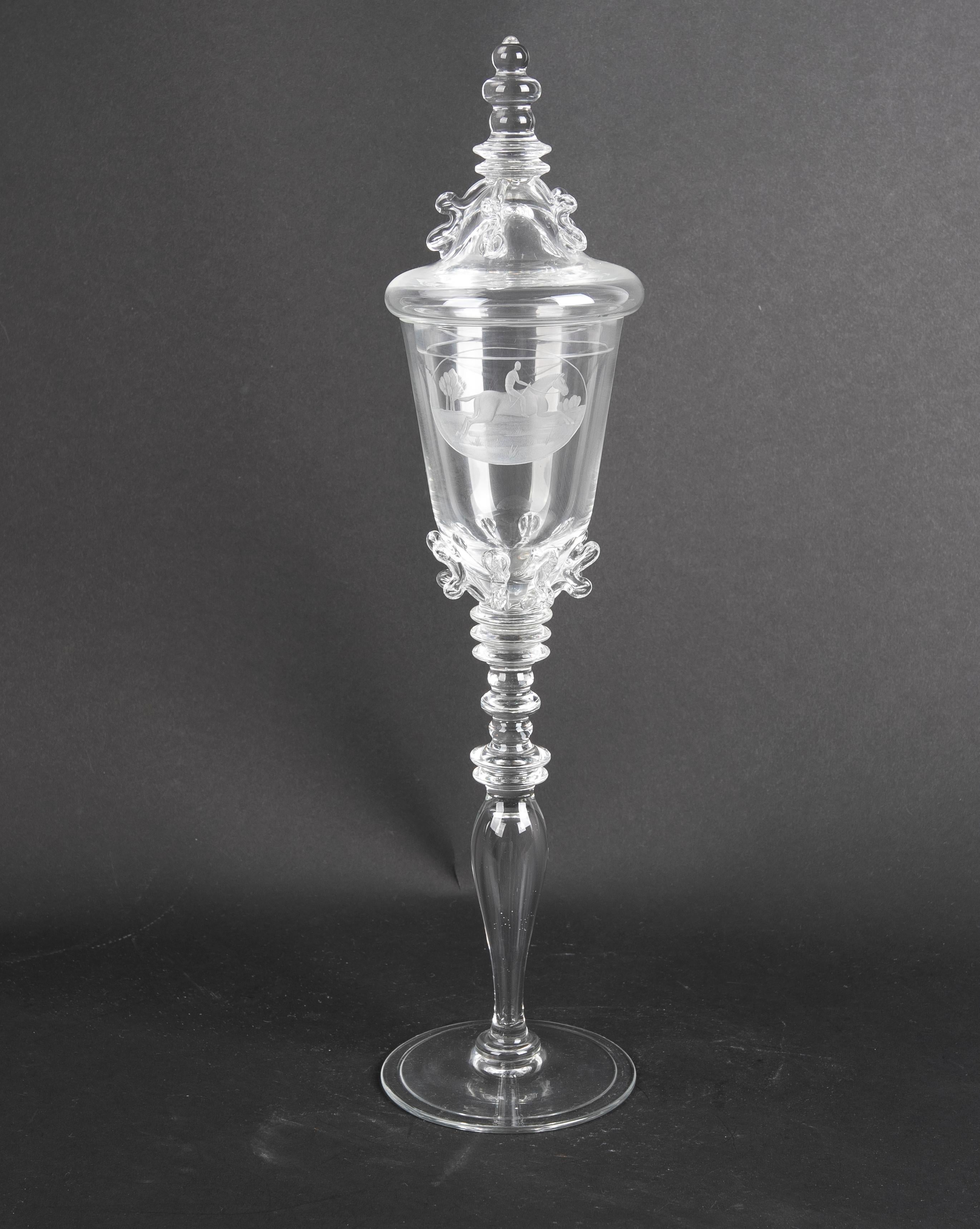 Three signed crystal glasses with lids and scenes of a horseman on horseback.