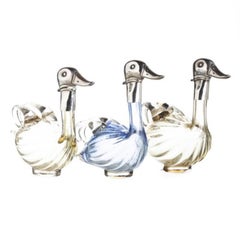 Three Silver Duck Bottles