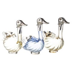 Three Silver Duck Bottles