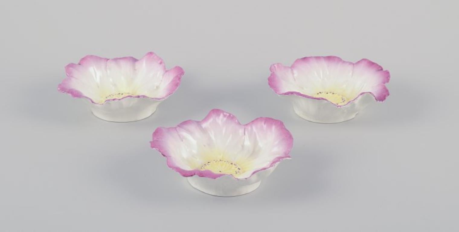 PRE-OWNED GOODS ARE EXEMPT FROM IMPORT TARIFFS FOR U.S., UK, AUSTRALIAN & CANADIAN CUSTOMERS.   
THEREFORE, NO IMPORT TARIFFS WILL BE APPLICABLE TO YOUR PURCHASE. 

Three small French Art Nouveau bowls in faience.
Floral shape. Hand-painted in