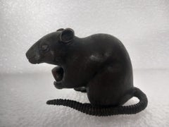 Three small Japanese bronze rats, Meiji Period, two holding chestnuts