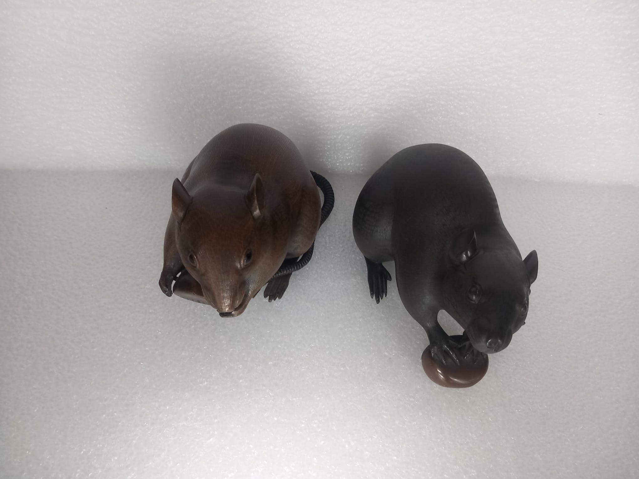 Three small Japanese bronze rats, Meiji Period, two holding chestnuts For Sale 1
