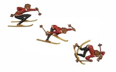 Three Snow Skiers Metal Wall Mounted Sculptures.  Signed Sexton 1972.