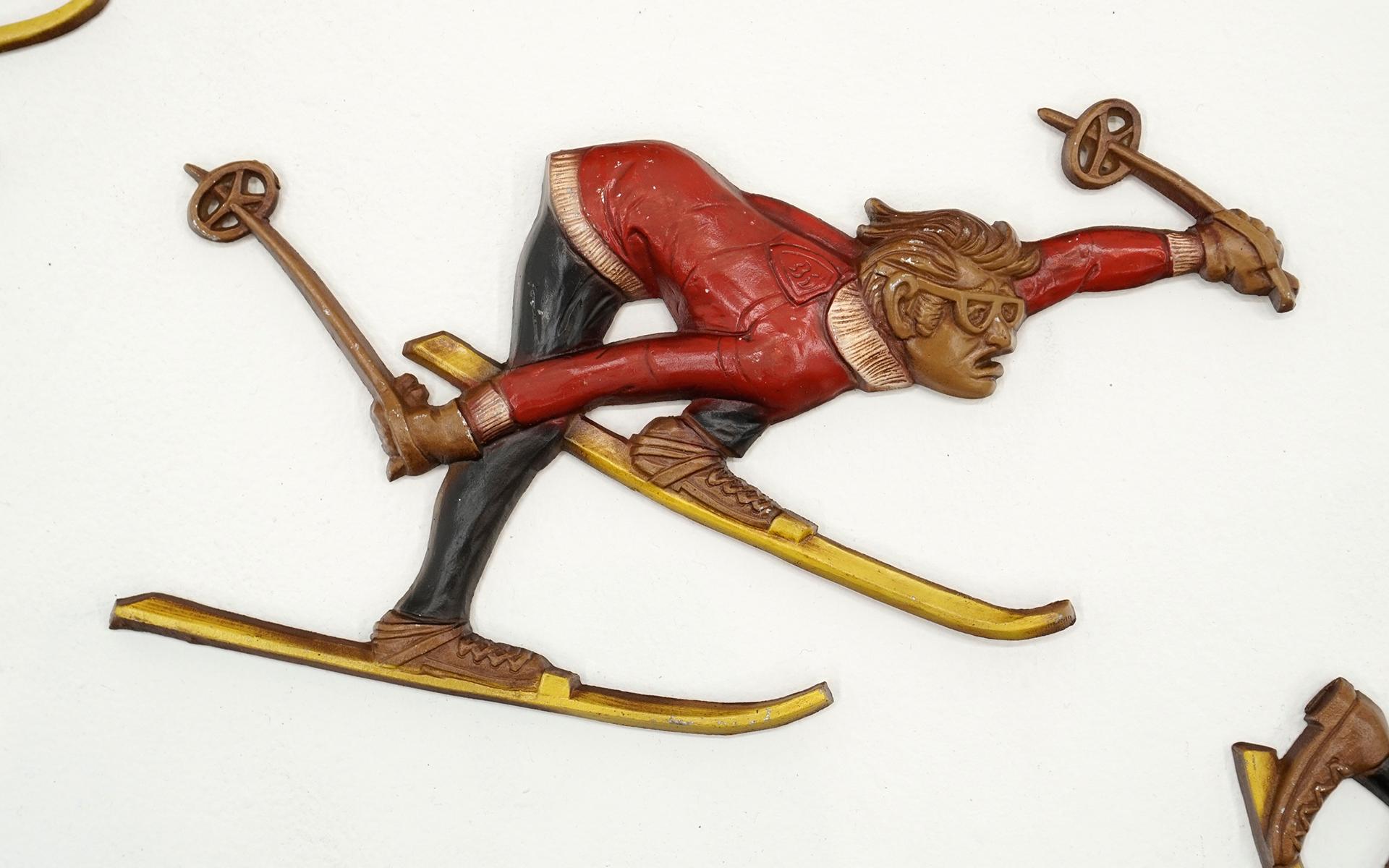 American Three Snow Skiers Metal Wall Mounted Sculptures.  Signed Sexton 1972.