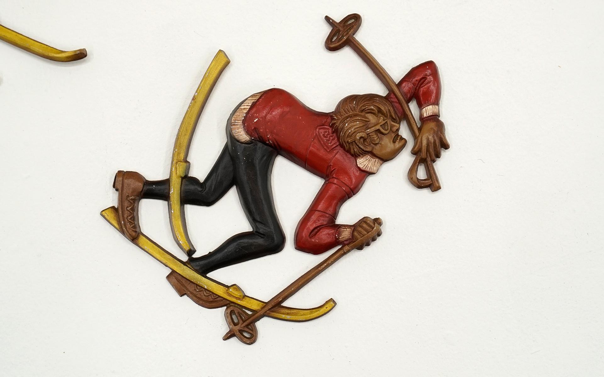Three Snow Skiers Metal Wall Mounted Sculptures.  Signed Sexton 1972. In Good Condition In Kansas City, MO