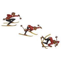 Vintage Three Snow Skiers Metal Wall Mounted Sculptures.  Signed Sexton 1972. 