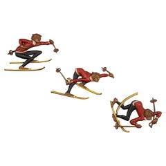 Three Snow Skiers Metal Wall Mounted Sculptures. Signed Sexton 1972.