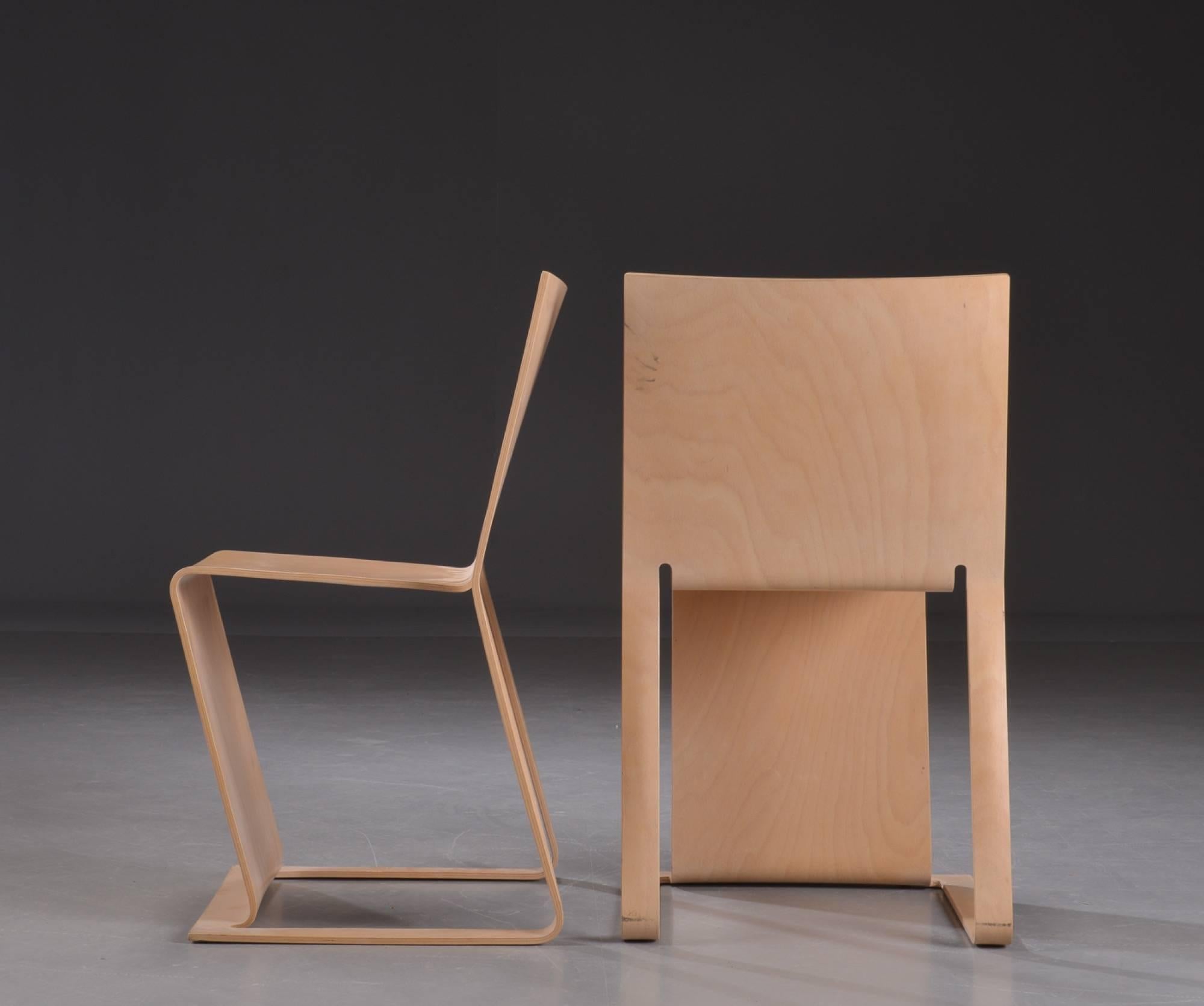 Lacquered Three Stacked Swedish lForm Chairs