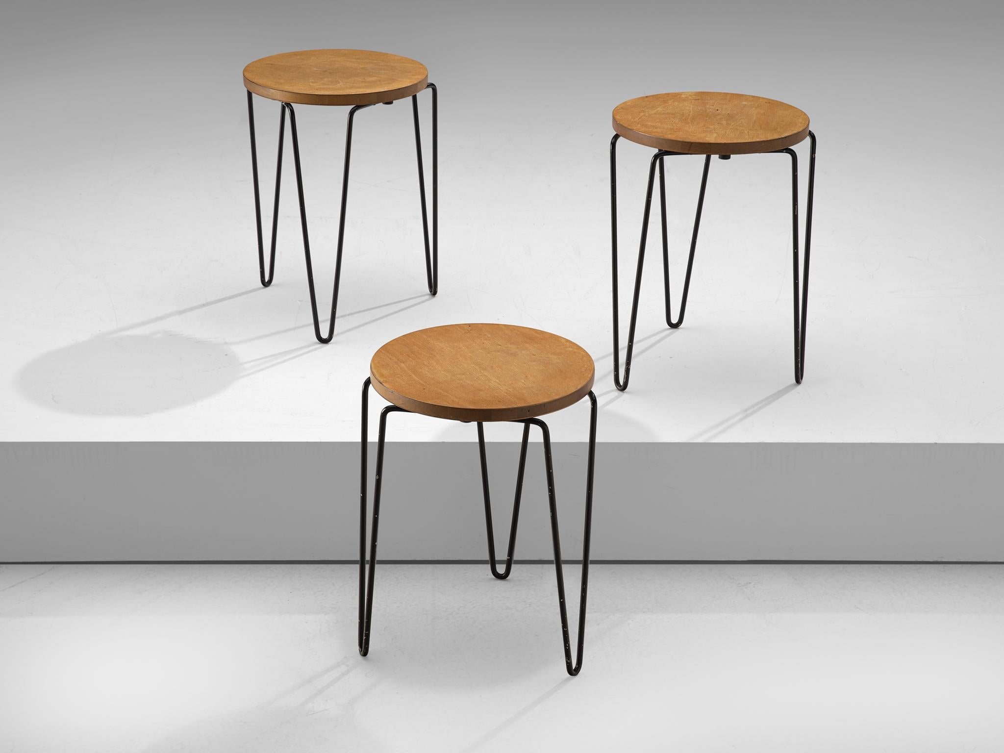 Florence Knoll for Knoll Associates, set of three stacking stool model 75, birch and metal, United States, 1948.

Florence Knoll’s Model 75 stacking stool, that   are made of a black lacquered steel, hairpin base and a birch top, and are