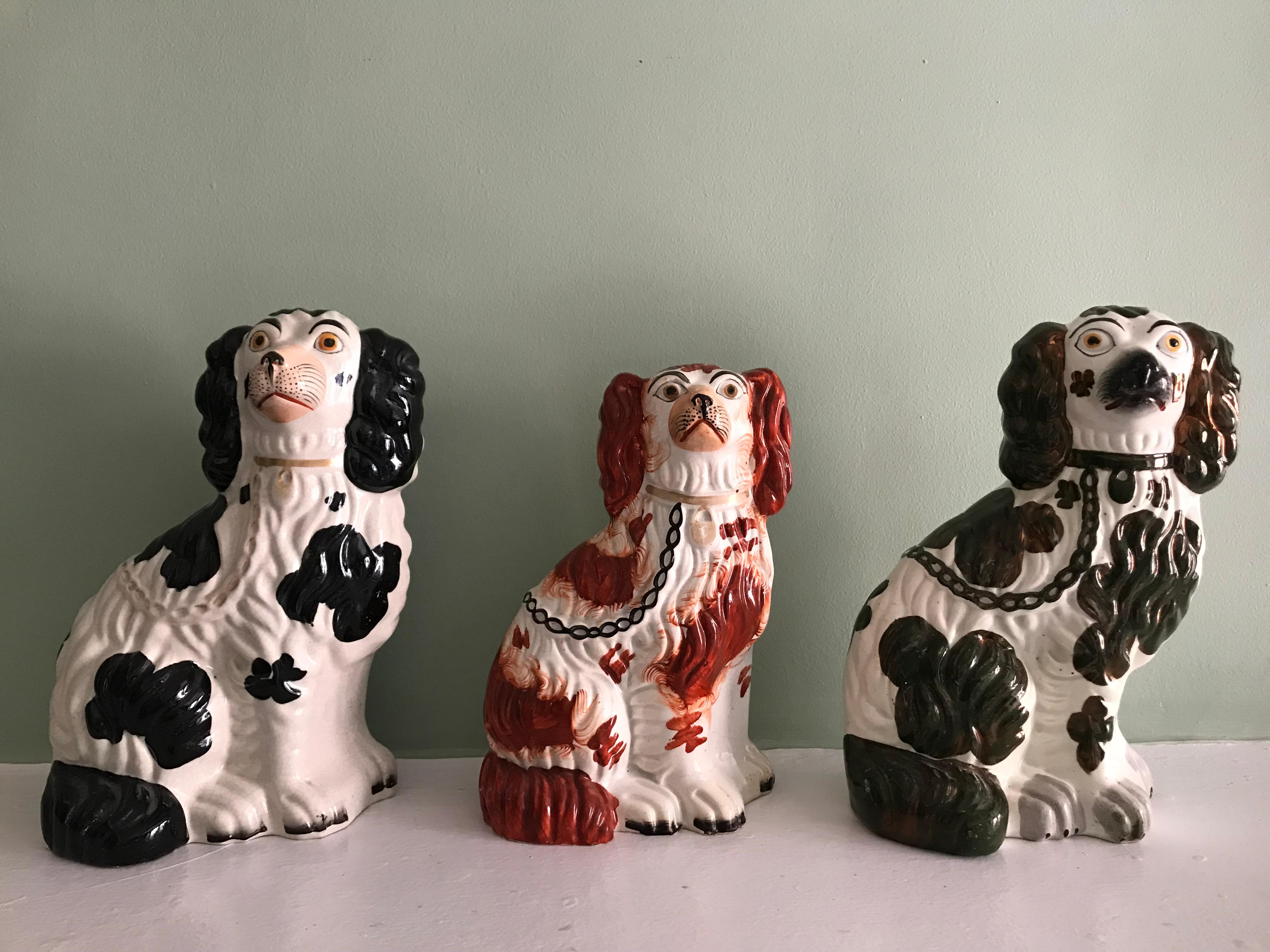 Victorian Three Staffordshire Dogs, with Different Color Spots & Gilded details, 19th C. For Sale