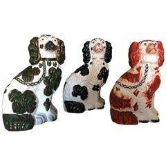 Antique Three Staffordshire Dogs, with Different Color Spots & Gilded details, 19th C.
